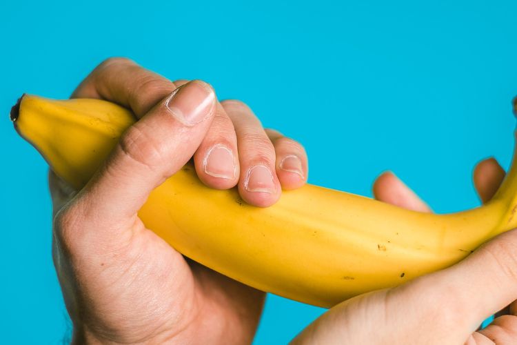 banana on the hand